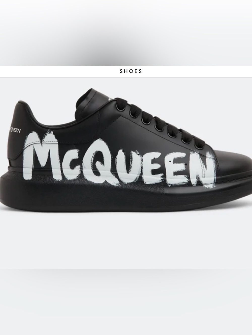 Alexander McQueen Black Leather Low-Top Sneaker with White 'McQueen' Graphic